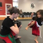 mma kids kickboxing delhi7d69a5_52d8b9c2b1814524bfde0be472c92782~mv2_d_4032_3024_s_4_2